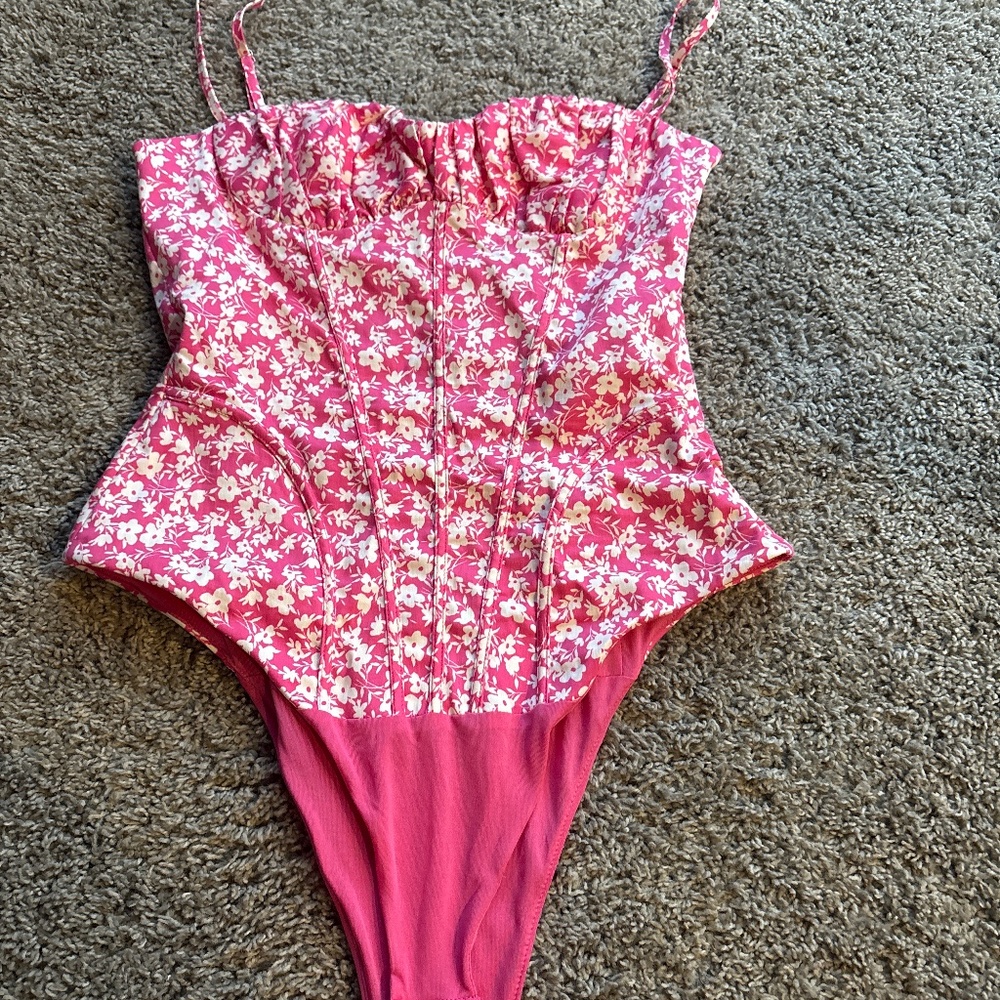 Pink bodysuit